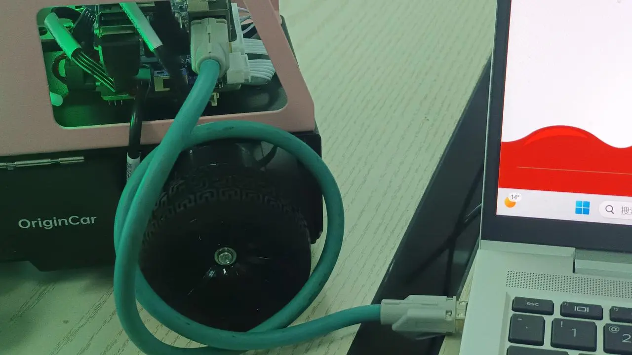 OriginCar connected to a laptop with an Ethernet cable